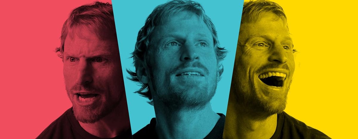 Tiled greyscale images of a man pulling expressive faces on red, blue, and yellow backgrounds with diagonal divisions.